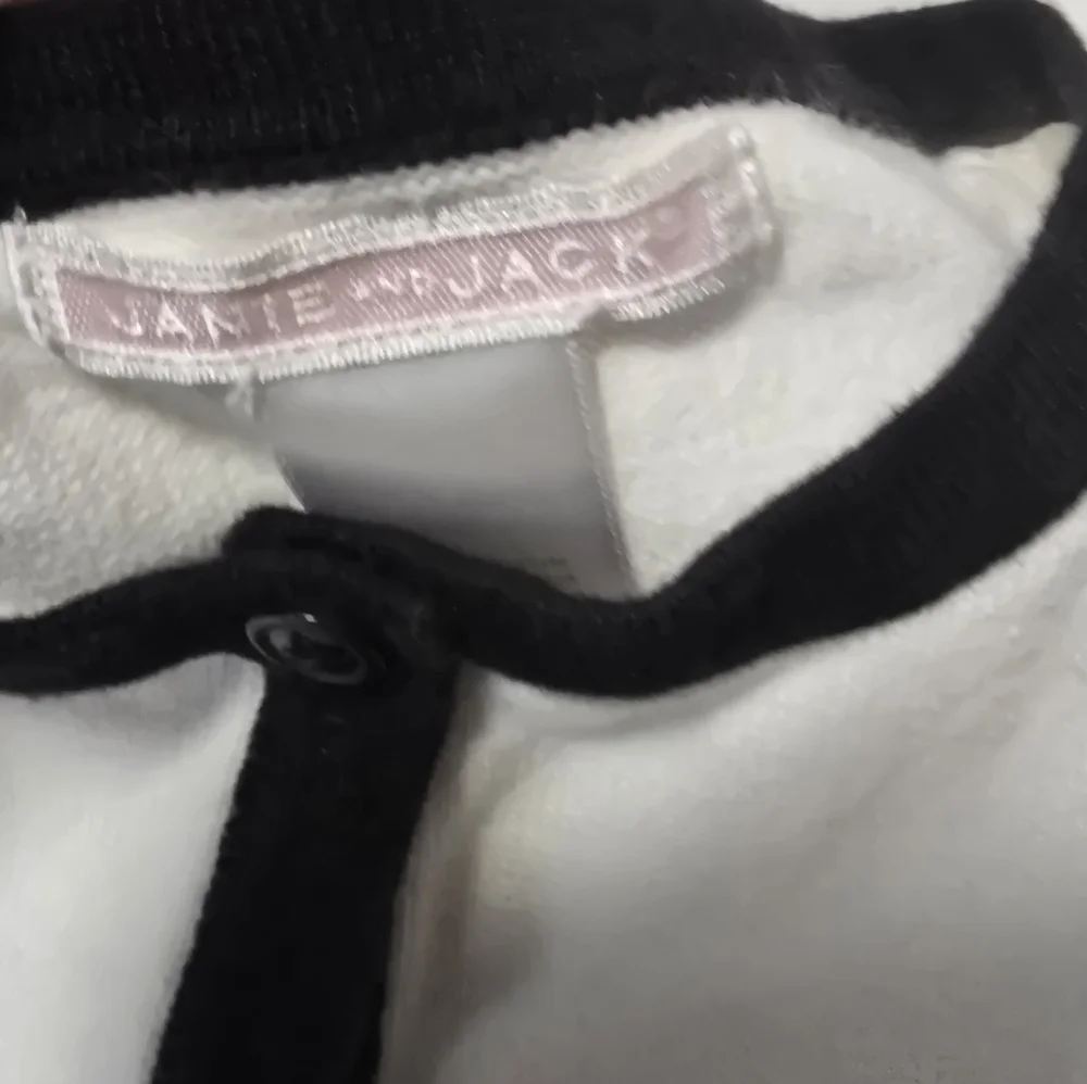 Janie and Jack Cotton White Cardigan with Black Bow Accents - Picture 7 of 11